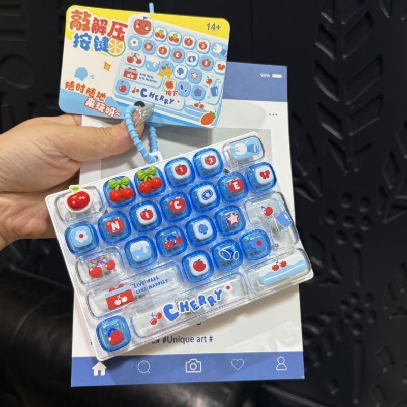 Home Office Gadgets - Kirsch-Themen Cartoon-Druck Fidget-Tastatur-Spielzeug Stressabbau Sensorisches Gadget